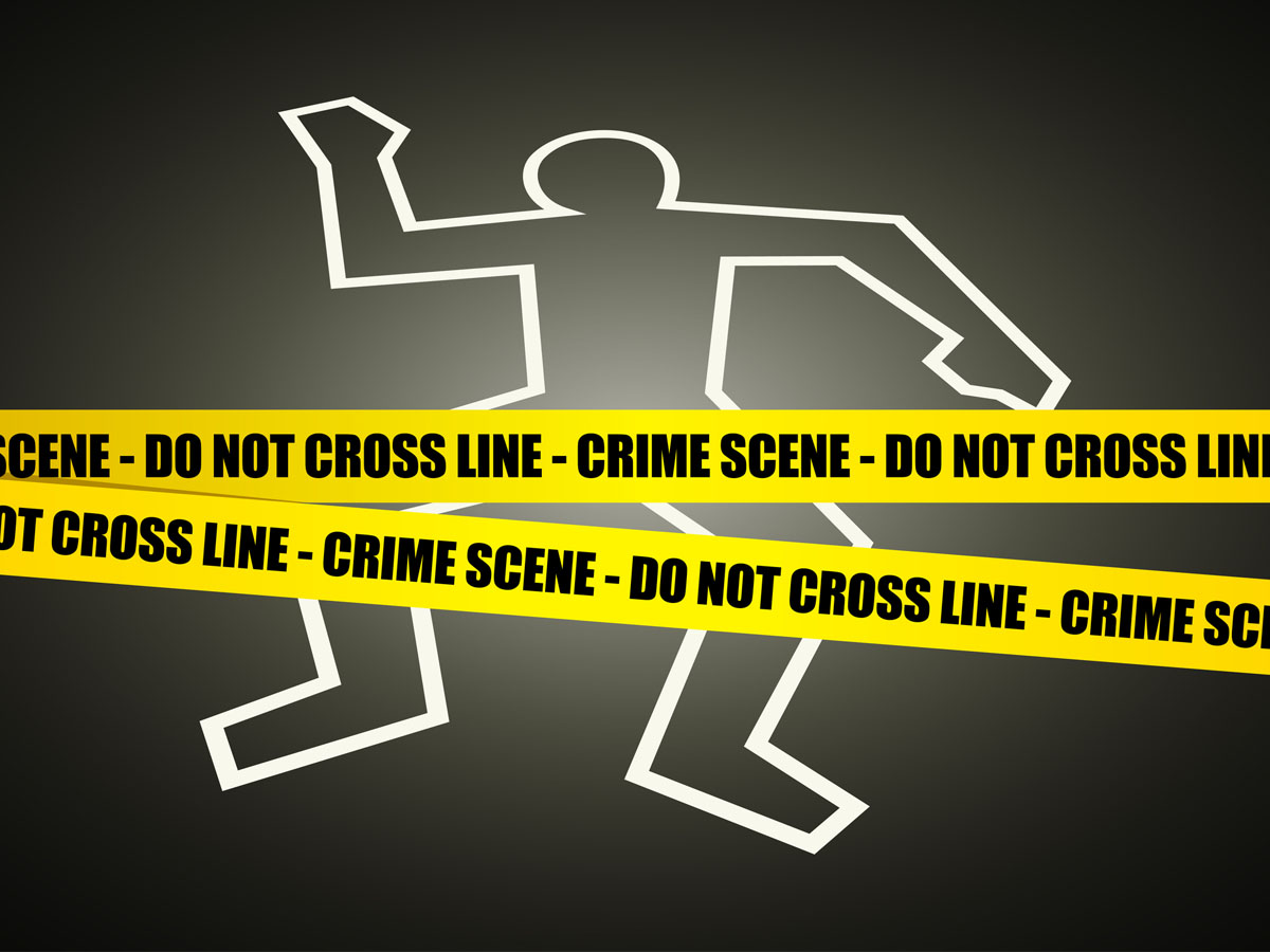 Crime Scene - Do Not Cross Lines over white outline of a person